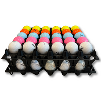 30-Cell Washable Black filled with golf balls stacked