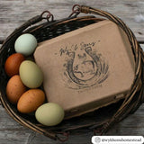 A natural paper pulp 12-egg vintage carton with a logo stamped on the font