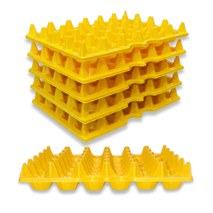 Stacked view of a sturdy 30-cell plastic reusable filler flat for eggs or machined parts