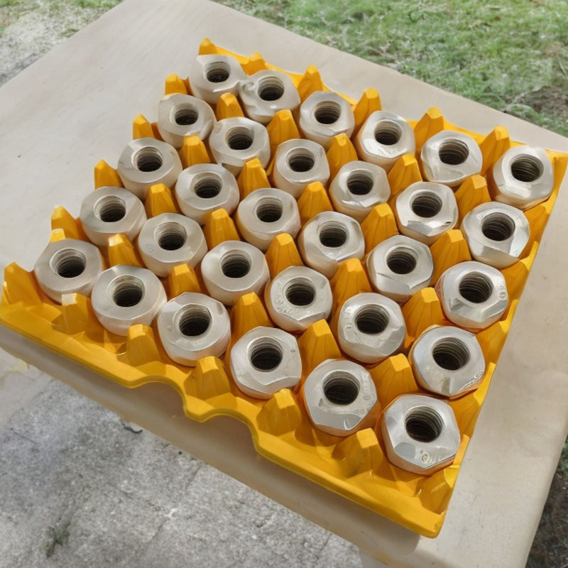 Egg Tray Filler Flat A yellow plastic, washable, resuable, 30-cell tray typically used for egg cartons filled with machine parts